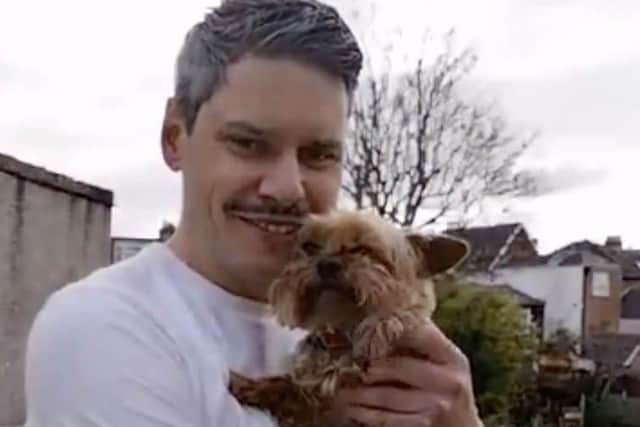 Pub landlord, Chris Vaux, has been playing a musical medley every evening from his balcony to help raise spirits of local residents.
PICTURED: Chris Vaux with his dog, Lola.