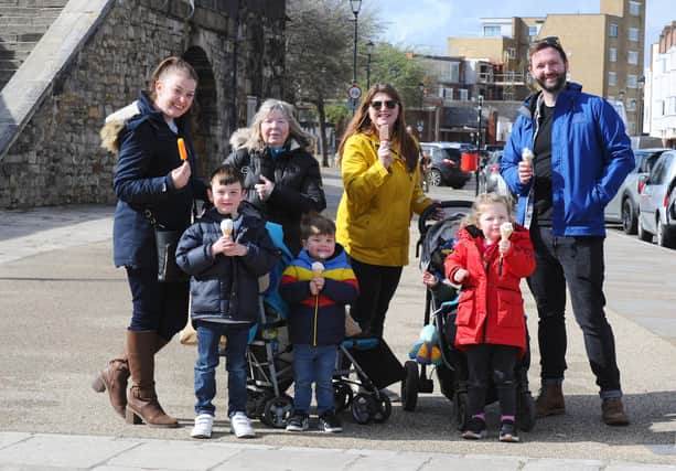 Pictured is: (back l-r) Fiona Woodall, Annie Hazel, Lucy Foskett and Jon Foskett with (front l-r) Arthur Woodall (6), Henry Woodall (3) and Betsy Foskett (4) visiting Portsmouth for the day from Aldershot.Picture: Sarah Standing (290324-6956)