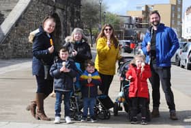 Pictured is: (back l-r) Fiona Woodall, Annie Hazel, Lucy Foskett and Jon Foskett with (front l-r) Arthur Woodall (6), Henry Woodall (3) and Betsy Foskett (4) visiting Portsmouth for the day from Aldershot.Picture: Sarah Standing (290324-6956)