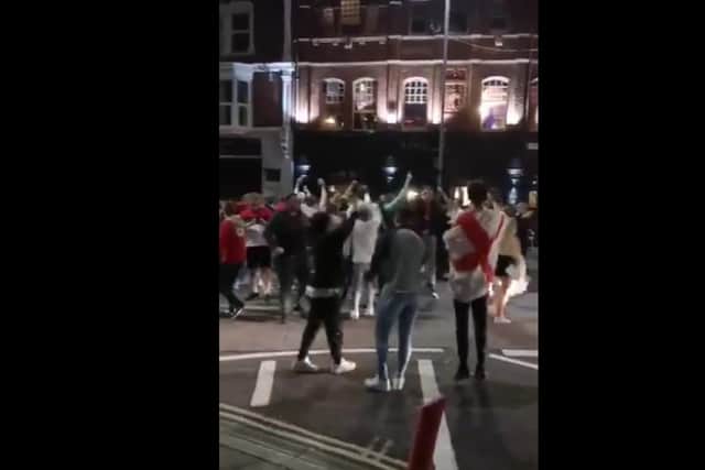 Police officers were called to Albert Road in Southsea after a large group congregated in the road on July 7 to ensure public safety. No arrests were made.
Pictured: A still from a video captured by Jake Fleming