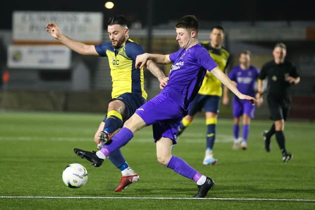 Moneyfields defender Jack Chandlet, left, v AFC Stoneham. Picture by Nathan Lipsham