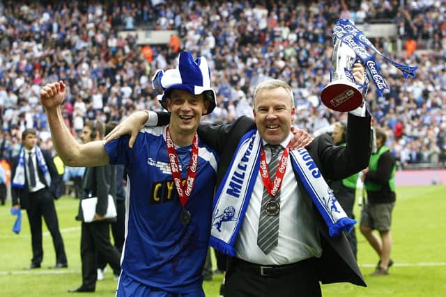Millwall skipper Paul Robinson celebrates with Kenny Jackett following Millwall's League One Play-Off final victory in 2010. Picture: Sean Dempsey