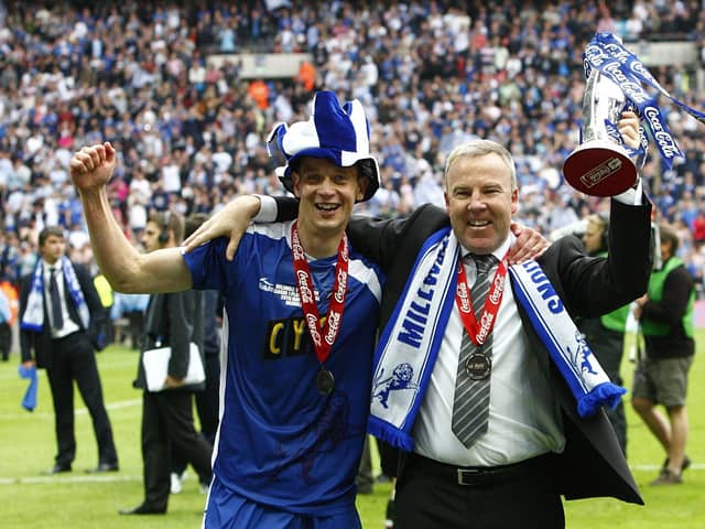 Millwall skipper Paul Robinson celebrates with Kenny Jackett following Millwall's League One Play-Off final victory in 2010. Picture: Sean Dempsey
