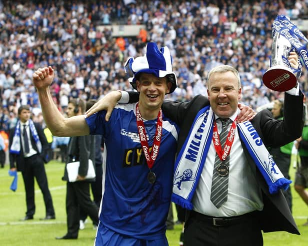 Millwall skipper Paul Robinson celebrates with Kenny Jackett following Millwall's League One Play-Off final victory in 2010. Picture: Sean Dempsey