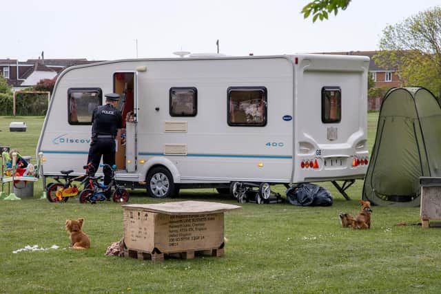 Police talking to travellers in Mengham Park in May