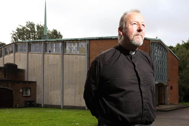 The Rev Jonathan Jeffery at St Francis Church, Leigh Park. Father Jonathan has been heartened by the response of the community to recent vandalism at the church. Picture: Chris Moorhouse (jpns 090821-03)