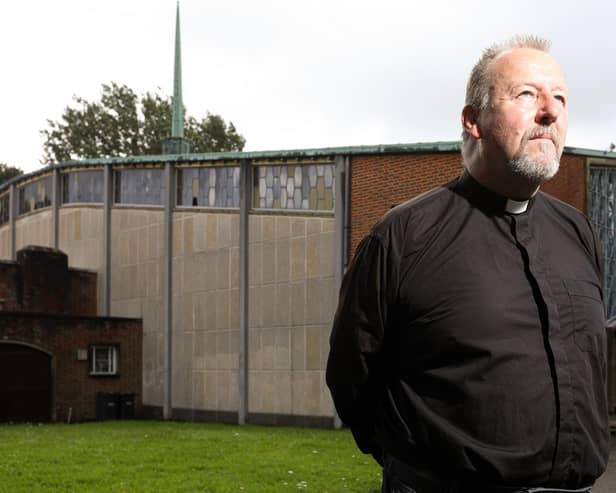 The Rev Jonathan Jeffery at St Francis Church, Leigh Park. Father Jonathan has been heartened by the response of the community to recent vandalism at the church. Picture: Chris Moorhouse (jpns 090821-03)