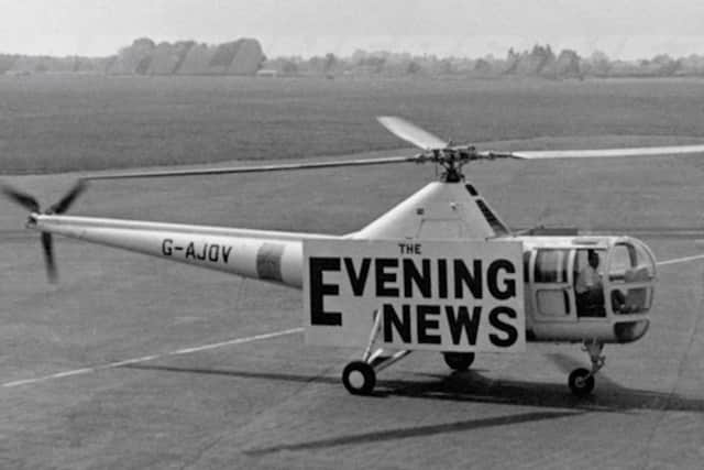 A helicopter prepares to take off with copies of The Evening News, but was it the Portsmouth or London version? Picture:: Ken Rimell