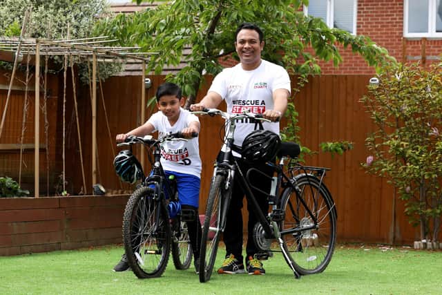 Local GP, Ebadur Chowdhury and his 10 year old son Amaan Chowdhury are cycling 200 kilometers to raise money for a charity that provides for Bangladeshi street children. Picture: Sam Stephenson