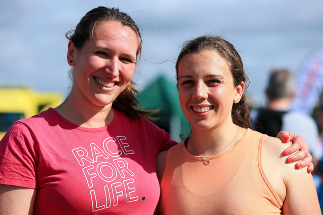 Amelia Samways, left, and Kate Simpson. Race For Life, Southsea Common. Picture: Chris Moorhouse (jpns 030722-03)