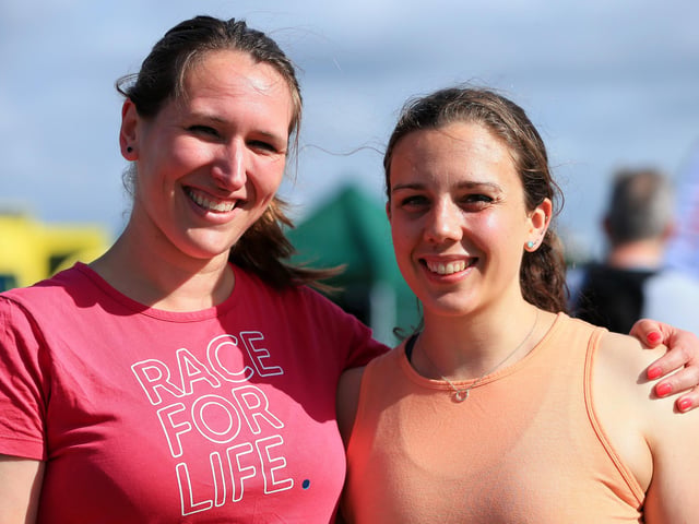 Amelia Samways, left, and Kate Simpson. Race For Life, Southsea Common. Picture: Chris Moorhouse (jpns 030722-03)