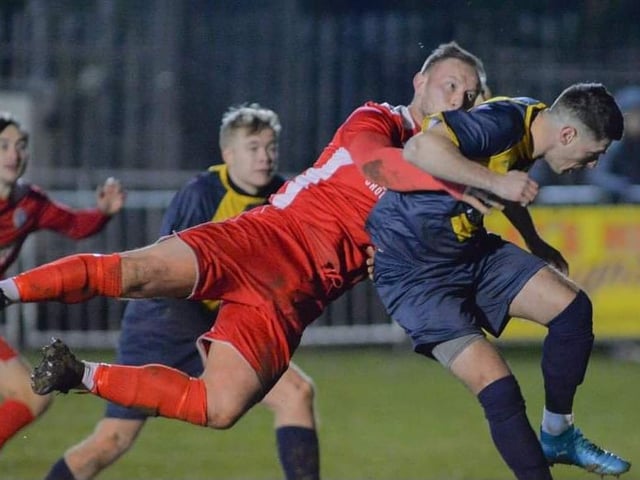 Horndean striker Connor Duffin attacks a cross. Picture by Martyn White