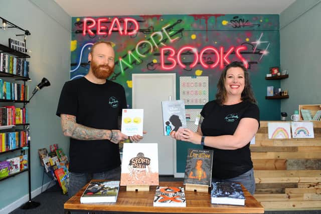 Mel and Phil Davies at their book shop Pigeon Books in Albert Road, Southsea. Picture: Sarah Standing (230620-483)