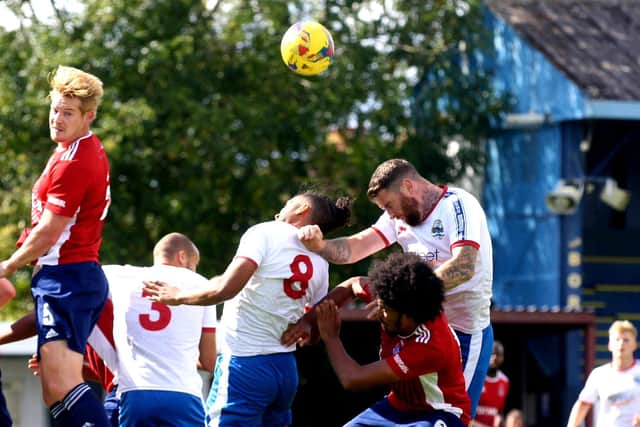 Ryan Woodford, right, in action for Gosport during last weekend's friendly loss to Hampton & Richmond Borough. Pic: Tom Phillips.