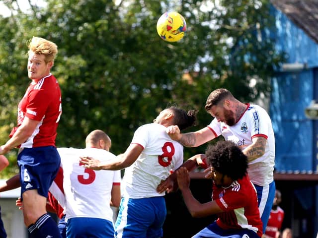 Ryan Woodford, right, in action for Gosport during last weekend's friendly loss to Hampton & Richmond Borough. Pic: Tom Phillips.