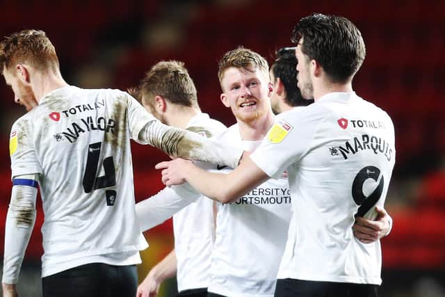 Andy Cannon, centre, celebrates his goal at Charlton on Tuesday. Picture: Joe Pepler