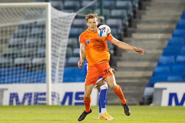 Sean Raggett was outstanding at the heart of Pompey's defence in last night's 2-0 win at Gillingham. Picture: Nigel Keene/ProSportsImages