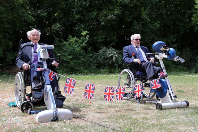 Normandy Veterans Peter Hawkins and Len Gibbon after they finished their 104-mile cycling challenge, to commemorate anniversary of the Normandy landing. Photo:: Gareth Fuller/PA Wire