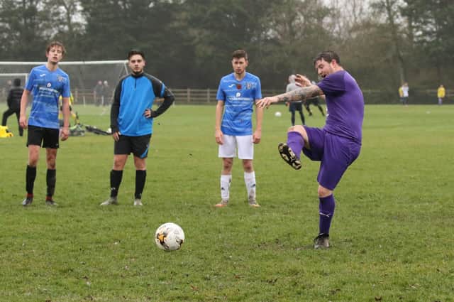 An Old Boys player about to miss a penalty during his side's cup loss to Waterlooville Wanderers Reserves. Picture by Kevin Shipp