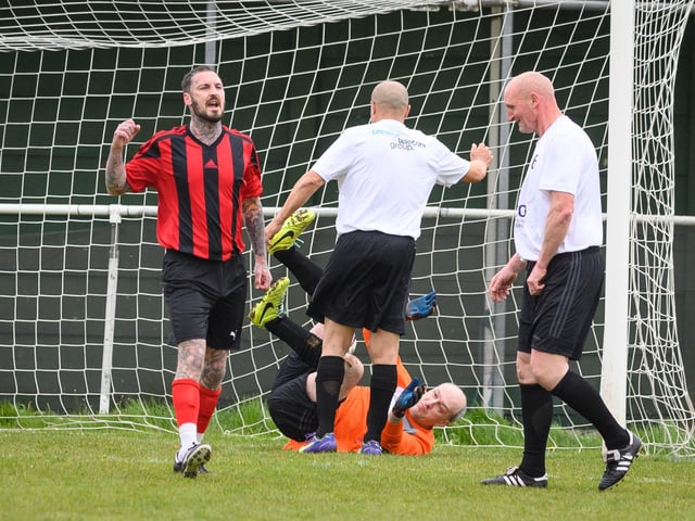 Action from the Jon Gittens memorial charity match between a team of former Fareham Town players and a side of ex-Pompey and Southampton professionals. Picture: Keith Woodland (160421-233)