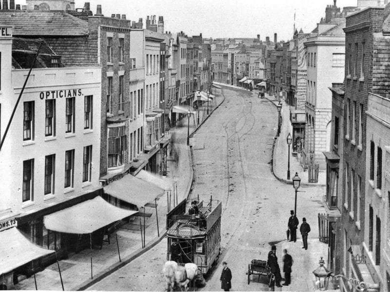 This wonderful shot was taken from the top of the Square Tower. High Street, Old Portsmouth as it looked before the Luftwaffe took its toll.
 In fact it is taken before the Great War. All the buildings on the left were destroyed and is now part of Cathedral Green.
The clocktower of the cathedral can be seen peeking over the rooftops, top left.