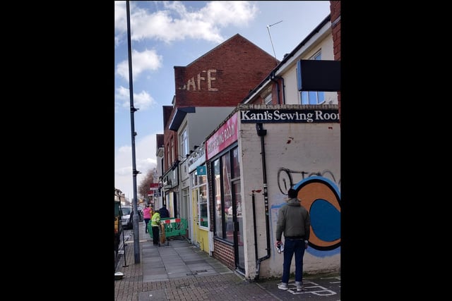 Another view of the sign in Albert Road, above The French. 'Cafe', it says.