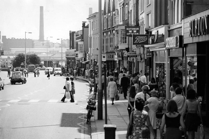 Gosport High Street, May 1976. Giant chimney across the water stands out similar to the present day Spinnaker Tower. The News PP452 