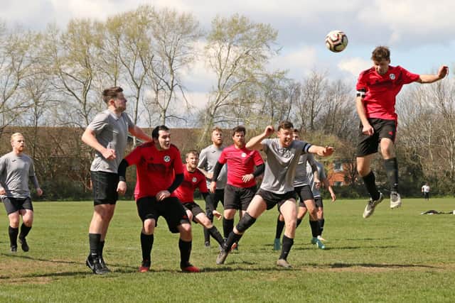 A Prospect Farm Rangers player gets in a header against Milton Park Rangers. Picture by Kevin Shipp