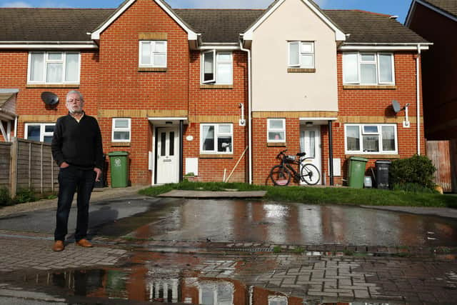 Michael Cox has had a water leak on his drive in Wymering for more than four months. He says there is a dispute between Stonewater Housing Association and Portsmouth Water as to who should fix it. Meanwhile the leak goes on. Picture: Chris Moorhouse (jpns 121122-33).