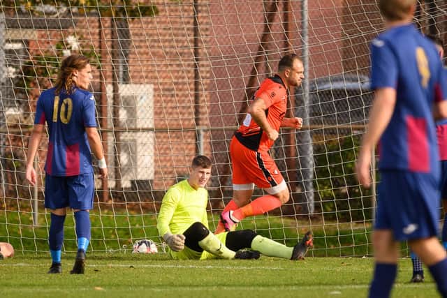 Brett Pitman has just scored one of his 49 goals for Portchester this season at US Portsmouth last October - he faces USP again this weekend. Picture: Keith Woodland