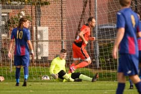 Brett Pitman has just scored one of his 49 goals for Portchester this season at US Portsmouth last October - he faces USP again this weekend. Picture: Keith Woodland