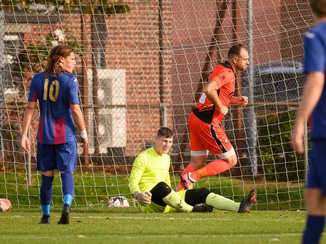 Brett Pitman has just scored one of his 49 goals for Portchester this season at US Portsmouth last October - he faces USP again this weekend. Picture: Keith Woodland