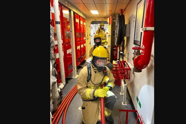HMS Queen Elizabeth crew have been 'giving it their all' this week as part of firefighting training.
