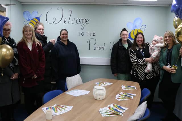 School staff and parents celebrate the opening of the Parent Hub at Meon Way Federation. Picture - Thinking Schools Academy Trust