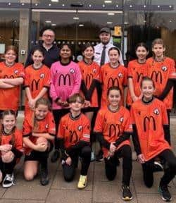 Franchisee Jose Calaza and the Under 11 Comets at Whiteley Shopping Centre McDonald's