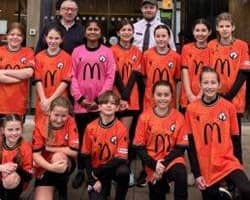 Franchisee Jose Calaza and the Under 11 Comets at Whiteley Shopping Centre McDonald's