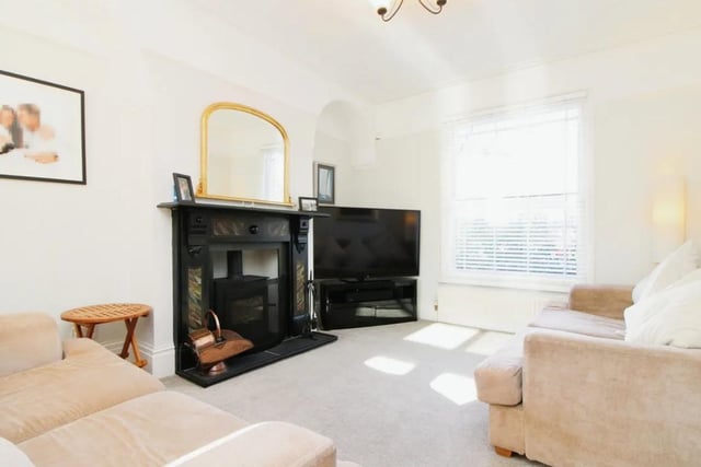 The listing says: "The current owners have re-roofed the existing house and maintained the render finish and quoin cornerstones in an attractive white/pale grey colour with grey timber sash windows on the front elevation."