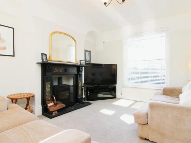 The listing says: "The current owners have re-roofed the existing house and maintained the render finish and quoin cornerstones in an attractive white/pale grey colour with grey timber sash windows on the front elevation."