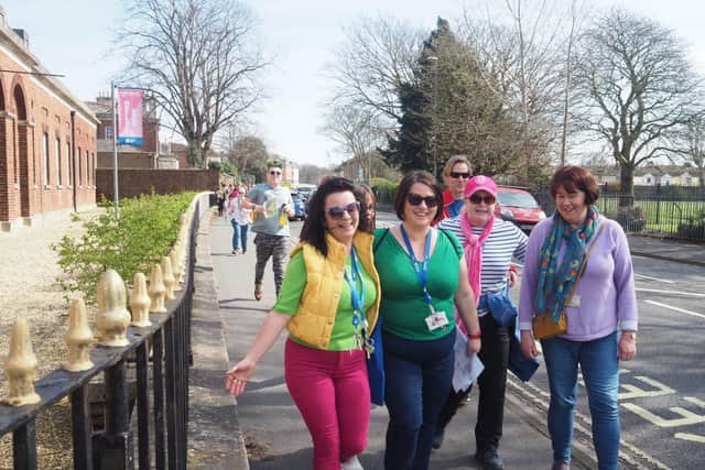 Students and staff taking part in the colour walk