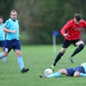 Jamie Peters, pictured making a sliding tackle, has been among the outfield players used in goal by Portchester Rovers this season.
Picture: Chris Moorhouse