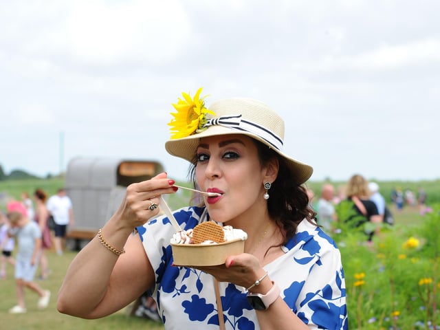 Sam's Sunflowers in Hayling Island, on Sunday, August 4, 2024.
Pictured is: Shamim Keivan from London, enjoying the ice cream sundae.
Picture: Sarah Standing (040824-3912)