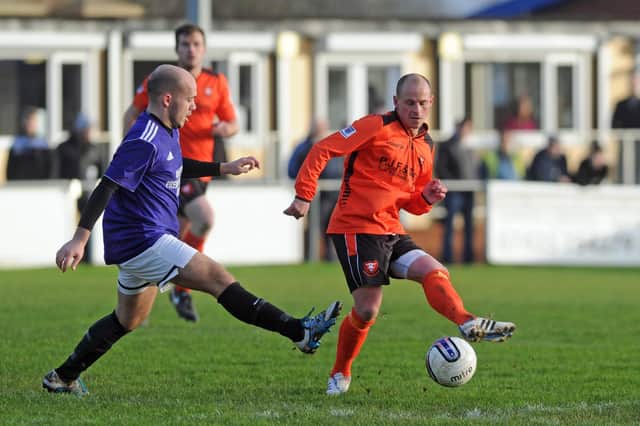 Dave Birmingham, right, in Wessex League Premier Division action for AFC Portchester against Cowes in January 2016.