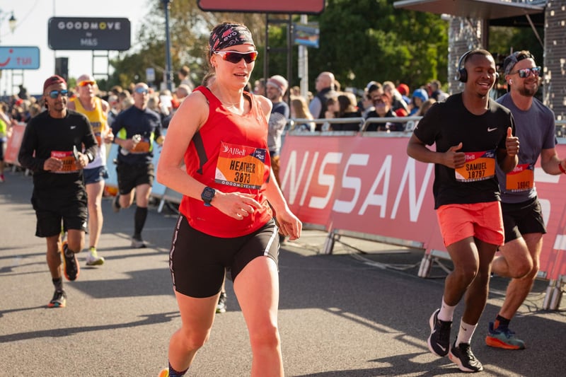 Pictured is: Runners cross the line to finish