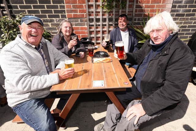 From left, Sid Kennett, Dee Miller, James Pimm and Trevor Evans. Drinkers enjoy the sunshine at the Parchment Makers, HavantPicture: Chris Moorhouse (jpns 240421-17)