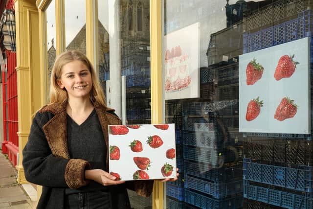 Artist Dominique Warren has a pop-up display of her work in a shop window in Marmion Rd, Southsea Picture: Chris Moorhouse (020121-13)