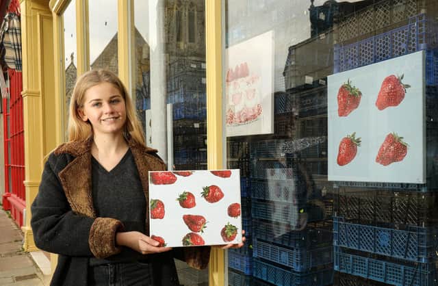 Artist Dominique Warren has a pop-up display of her work in a shop window in Marmion Rd, Southsea                                 Picture: Chris Moorhouse      (020121-13)