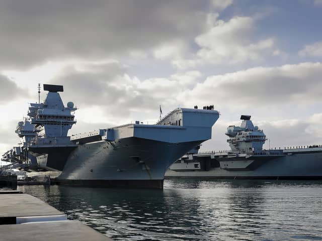 HMS Queen Elizabeth and HMS Prince of Wales, Britain's aircraft carriers, come together in their home port of Portsmouth for the first time. Photo: Leading Photographer Ben Corbett