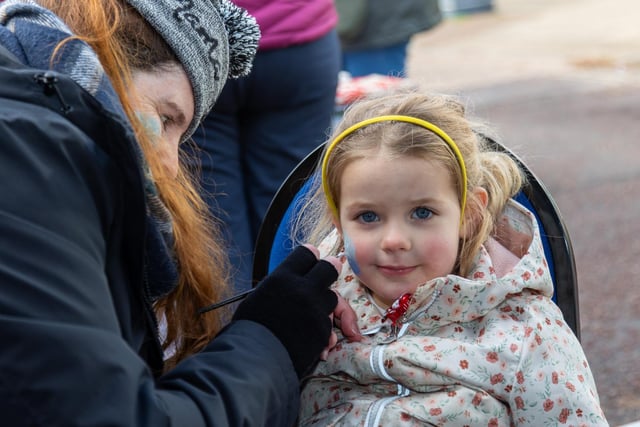 Locals braved the cold to celebrate the start of the Christmas festivites with a street party on Hayling Island on Saturday afternoon.

Pictured - Violet Cole, 3 getting her face painted.

Photos by Alex Shute