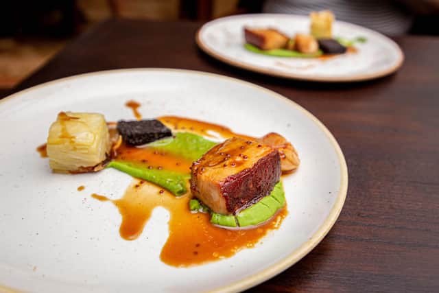 Pork belly and scallops, served as part of a taster selection from the new menu in The Queens Hotel. Picture: Habibur Rahman