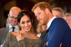 Prince Harry whispers to Meghan Markle Picture: Ben Birchall - WPA Pool / Getty Images